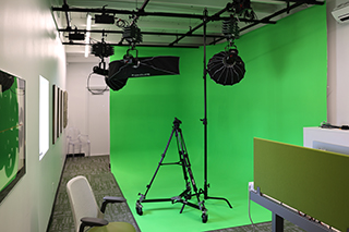 Green screen cove and overhead lighting grid in the Digital Video Studio