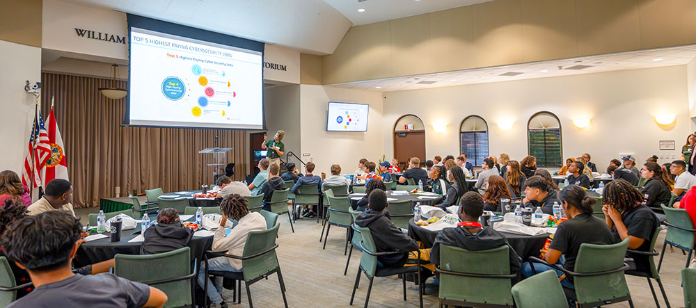 Professor Giti Javidi speaks to high school students during the Cybersecurity and AI Day in the Selby Auditorium in October 2024.