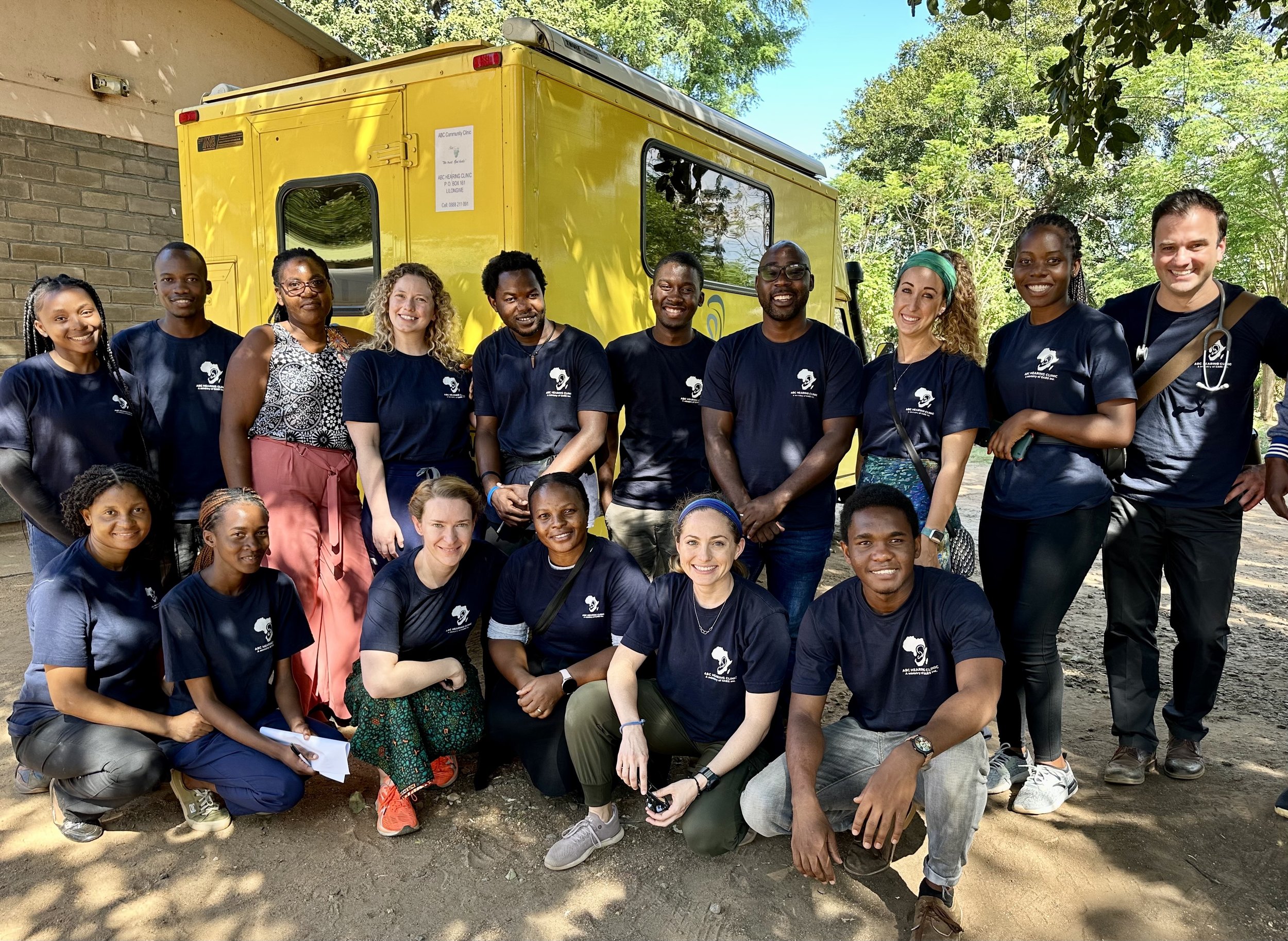 Madison Dowdy (second row, third from right) spent 14 days in Malawi providing audiologic outreach services.