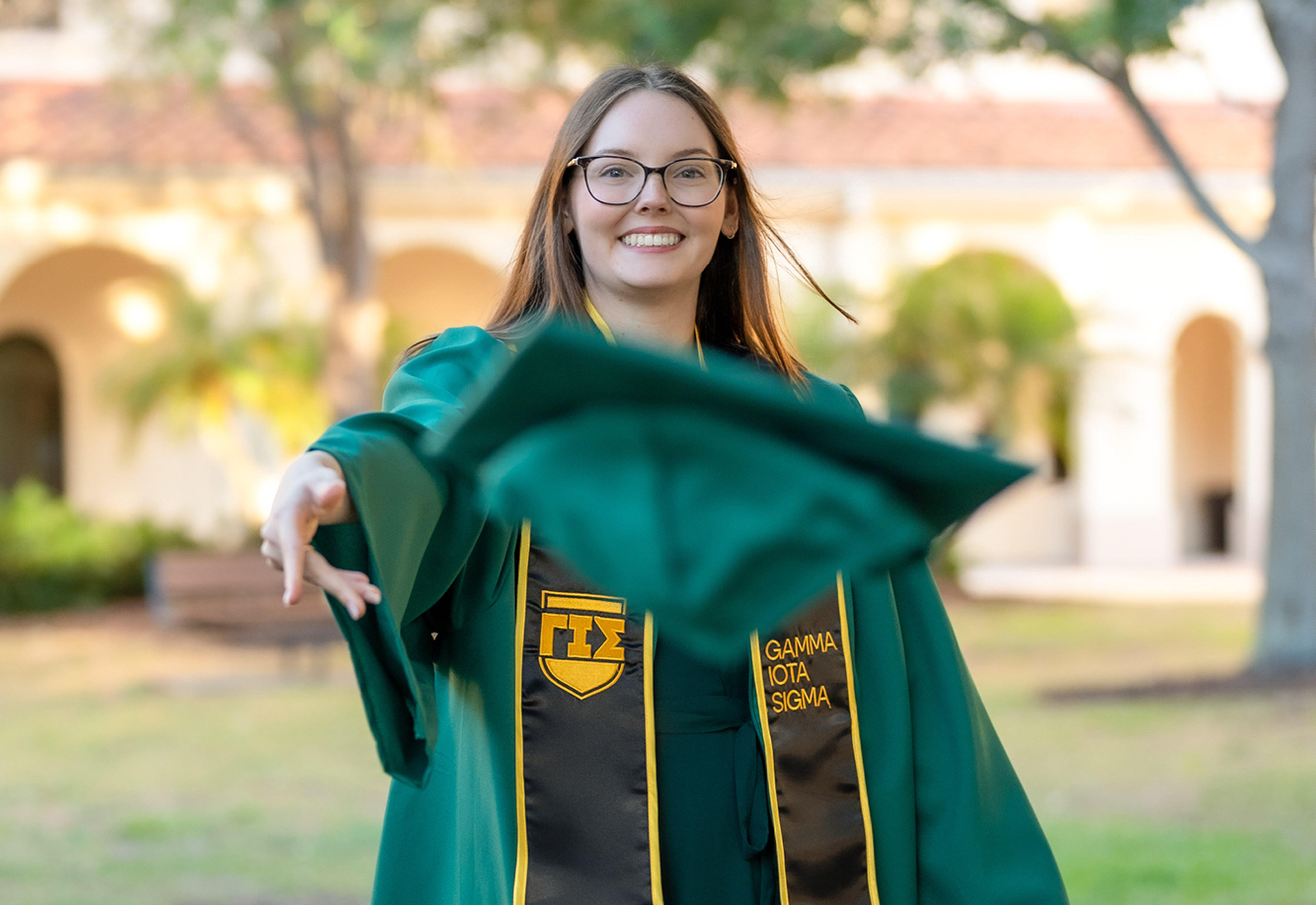 Madison Siefert in academic regalia