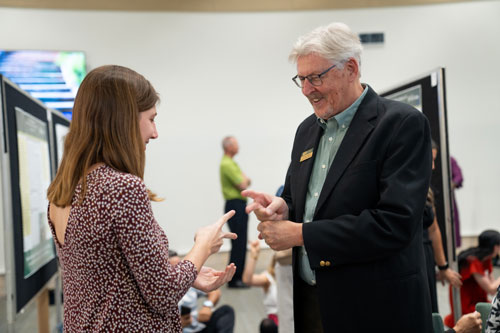 Blair Bloomston, founder of Leaders Uplifted, taught attendees to play “rock, paper, scissors, unite,” and encouraged the student researchers to connect with one another through the spirit of play. Here she demonstrates with Greg Smogard, assistant vice president of innovation and business development at USF Sarasota-Manatee.