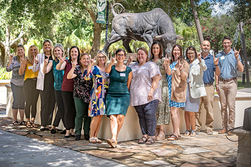 Foundation and USF staff celebrating new scholarships of Education