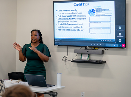 Alexandria (Alex) Davis presents on financial literacy topics 