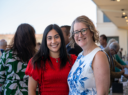 USF student Alison Frate and Cayla Lanier, Sarasota-Manatee campus dean for the USF Judy Genshaft Honors College.