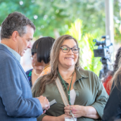 Victoria Ramirez talks with student