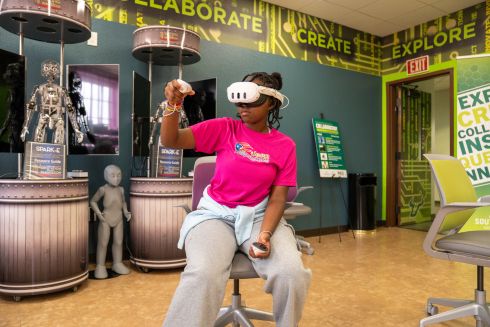 Student wearing virtual reality headset